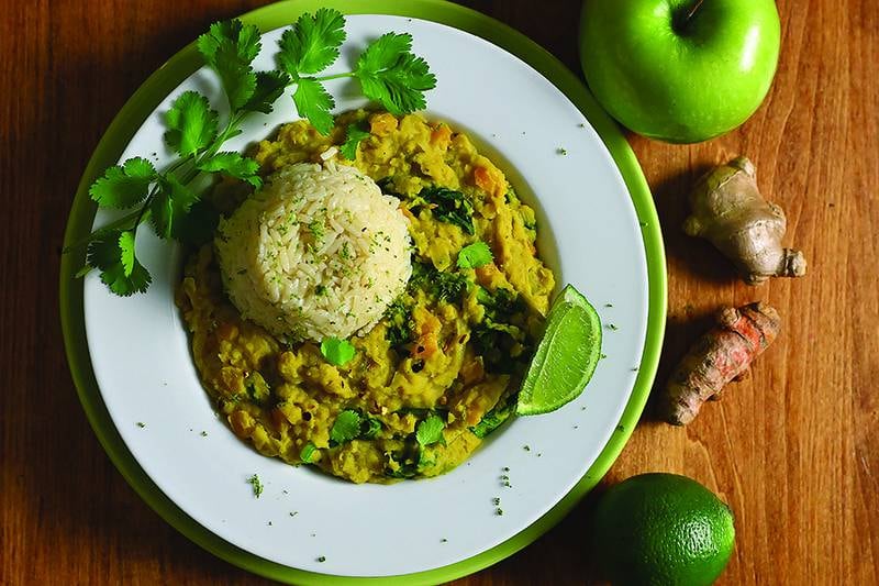 Fresh ginger and turmeric bring warmth, color and depth to this Golden Coconut Dal with apple and lime.