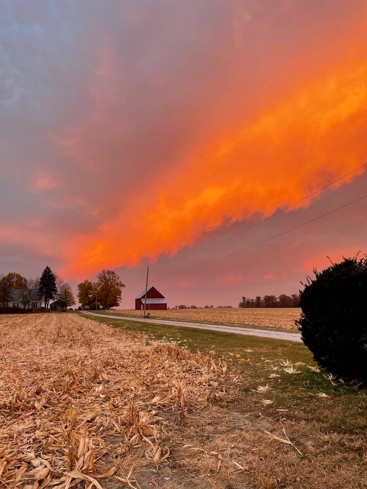 “Spectacular Clouds” — Elizabeth Harner: “A grand cloud display over our last field at harvest.”
