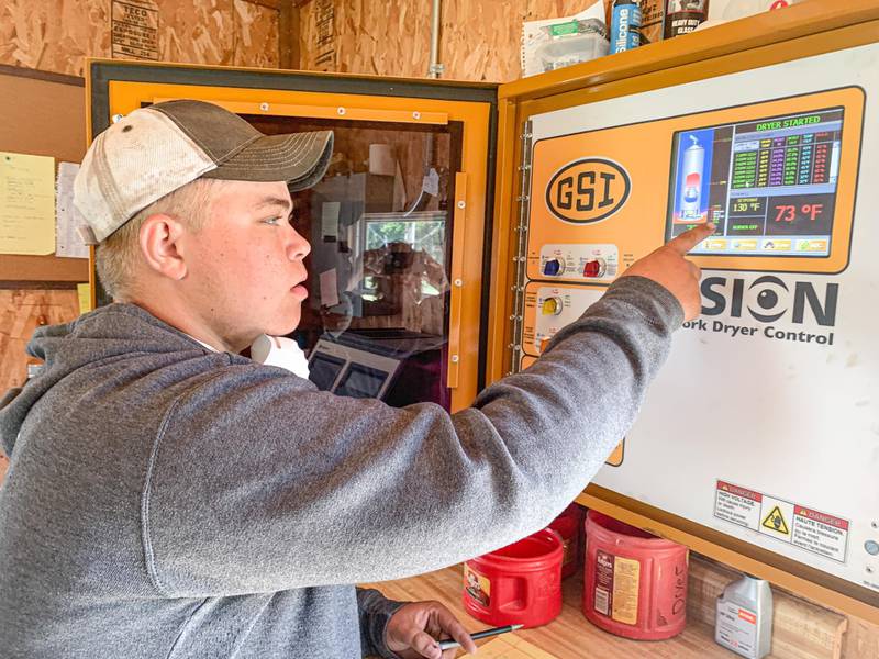 Lance Moritz looks at the grain drying system controls on his family’s farm to make sure it is running properly. The Streator FFA member is one of four finalists for the American Star in Agricultural Placement award that will be announced during the 96th National FFA Convention and Expo in Indianapolis.