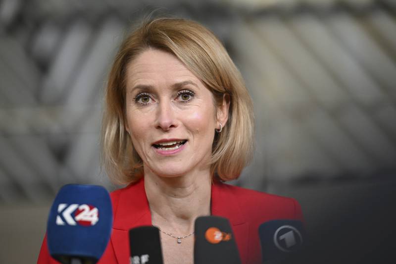 European Union foreign policy chief Kaja Kallas speaks with the media as she arrives for a summit in Brussels.