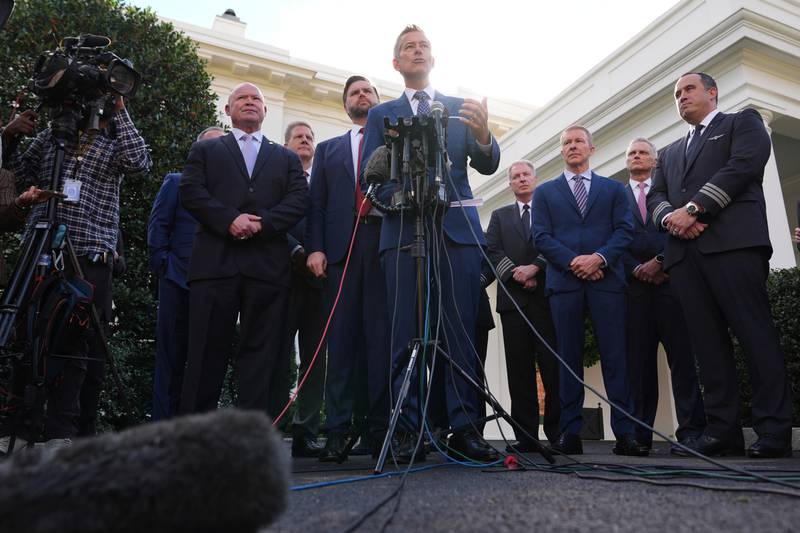 Transportation Secretary Sean Duffy speaks to the media alongside Sean O'Brien, president of the International Brotherhood of Teamsters (from left), Chris Sununu, president and CEO of Airlines for America, Vice President JD Vance and aviation industry representatives about the impact of the government shutdown on the aviation industry outside of the West Wing of the White House.