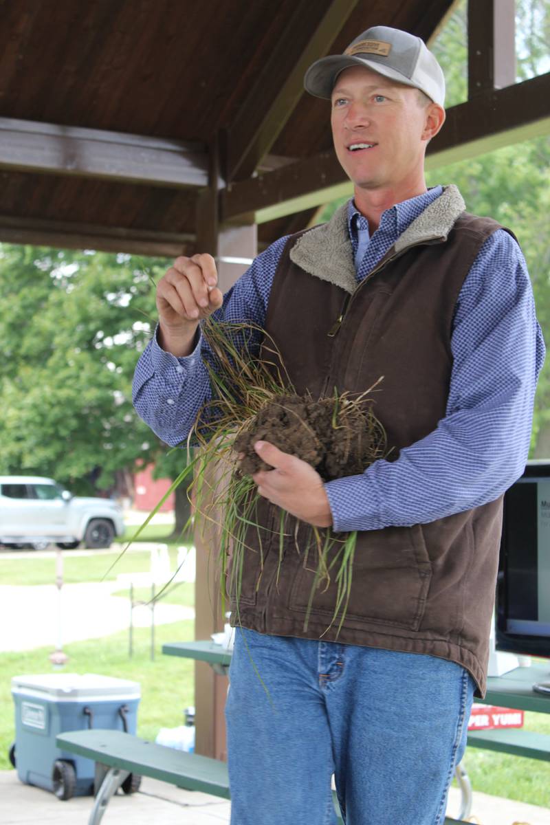 David Kleinschmidt talks about the how soil aggregates are formed by microbes and plant roots during a Regenerative Grazing School hosted by the Illinois Grazing Lands Coalition. Graziers can learn a lot about their soils by digging in their fields.