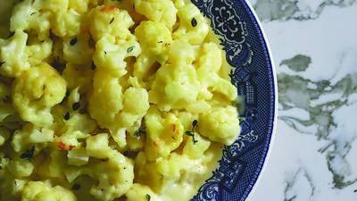 The humble cauliflower gets a golden, gooey makeover