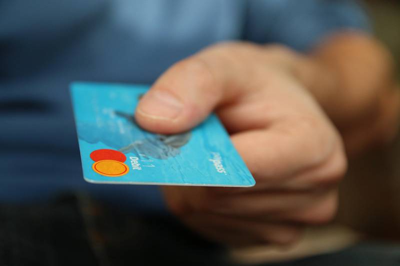Officials are warning about a scam that involves tricking people into cutting up their bank cards and sending the remains to fraudsters.