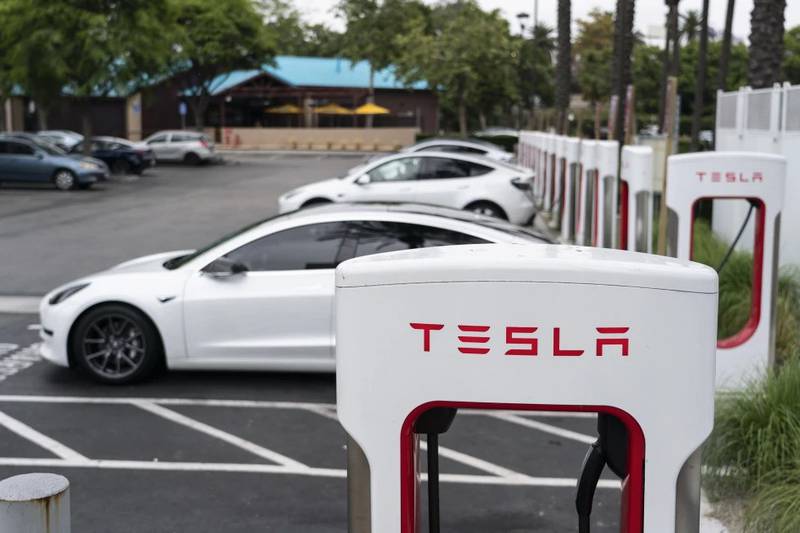 Tesla electric vehicles are charged at a charging station in Anaheim, California.