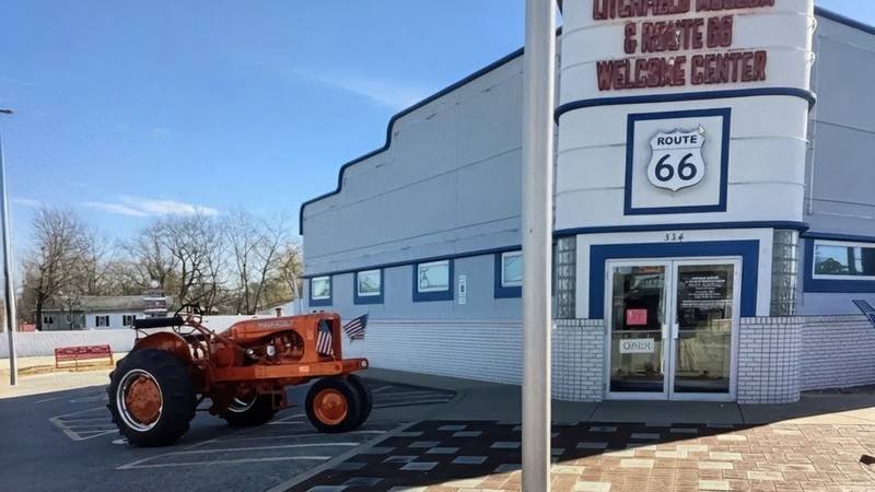 Jim Nieman’s Allis-Chalmers tractor is parked in front of the Litchfield Museum and Route 66 Welcome Center in south-central Illinois, the starting point for a tractor drive at 9:30 a.m. on June 20 to celebrate the 100th anniversary of the iconic highway.