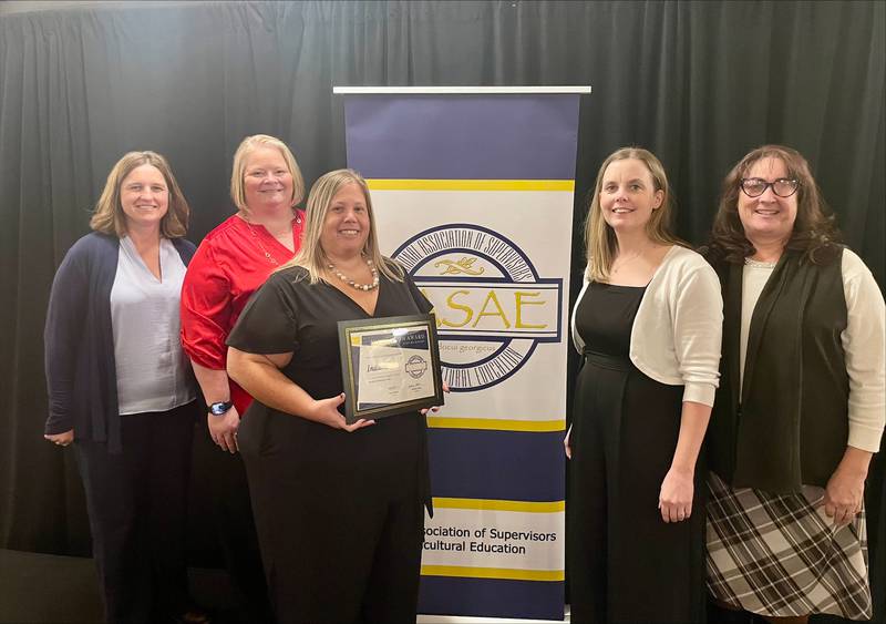 Indiana FFA staff members Holly Wagner (from left), Anna Ariens, Amanda Mullins, Tami Ketchen and Lisa Chaudion were recognized with the Innovation Award from the National Association of Supervisors of Agricultural Education.