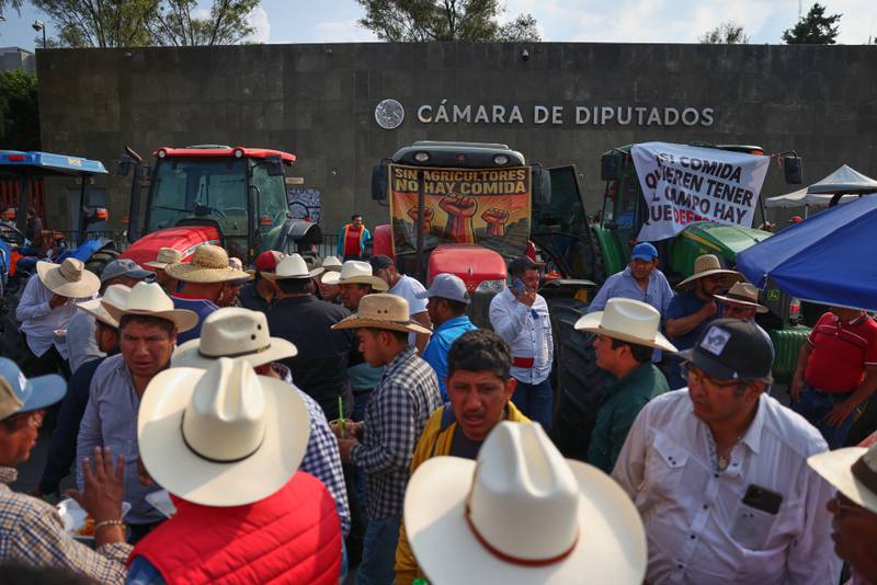 Farmers protest a proposed water law outside the Chamber of Deputies in Mexico City.