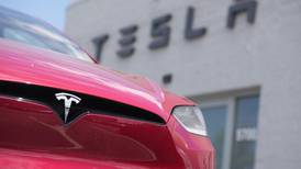 Tesla income jumps 20%, but shares fall amid profit concerns