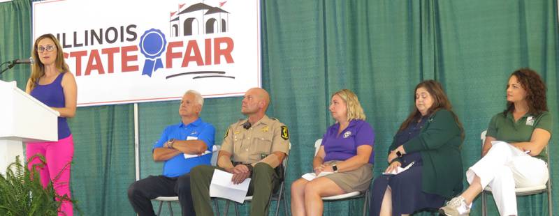 “Adventure Awaits” those attending the Illinois State Fair Aug. 7-17 in Springfield. Various highlights of the fair were outlined during a media preview on July 31. Participants included Fair Manager Rebecca Clark (from left); Jerry Boster, American Business Club of Springfield; Commander Josh Adcock, Illinois State Police Troop 6; Kendra Anderson, Midwest Dairy; Kayla Graven, Illinois Department of Agriculture domestic marketing manager; and Natalie Finnie, Department of Natural Resources director.