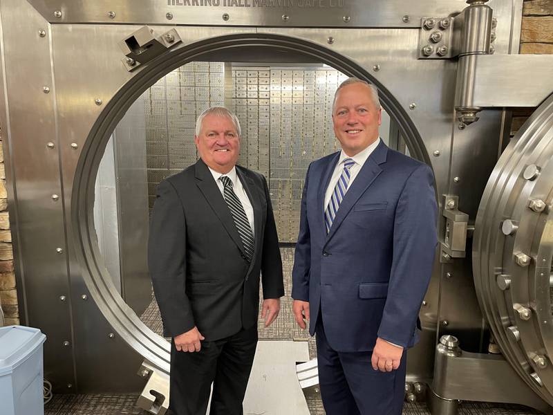 Tim McConville (left) is transitioning to president and CEO of Tri-County Financial Group, the holding company of First State Bank, which is appointing Kirk Ross as his successor as president and CEO of the bank.