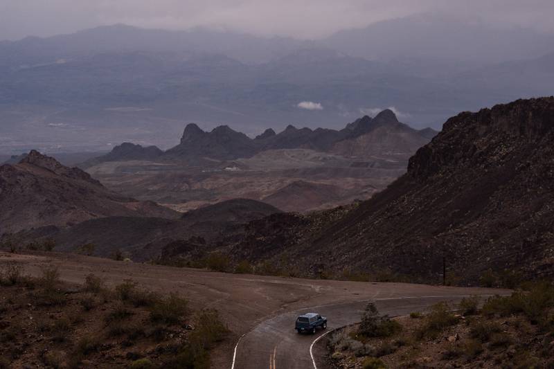 A car is driven along Oatman Highway, historic Route 66, near Oatman, Arizona.