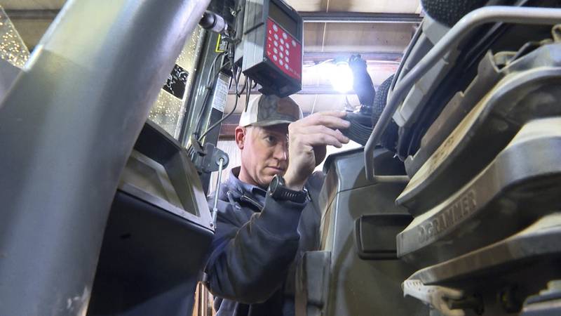 Bryant Kagay, part owner of Kagay farms in Amity, Missouri, works on equipment to get ready for planting his crops this year while worrying about the effects of President Donald Trump’s tariffs.