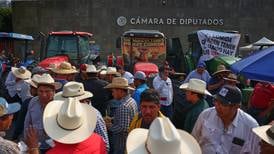 Farmers block Mexico’s Congress with tractors in protest against new national water law proposal