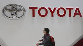 Toyota reports quarterly profit decline amid chips crunch