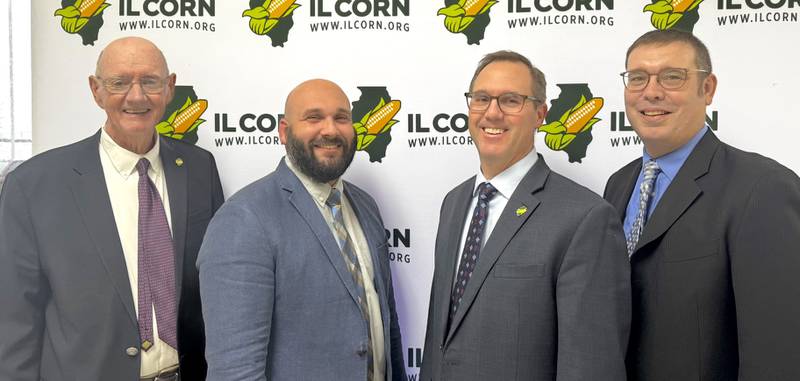 New Illinois Corn Growers Association officers seated at the Nov. 25 meeting were Don Guinnip (from left), vice president; Michael Houston, treasurer; Matt Shane, secretary; and Mark Bunselmeyer, president.