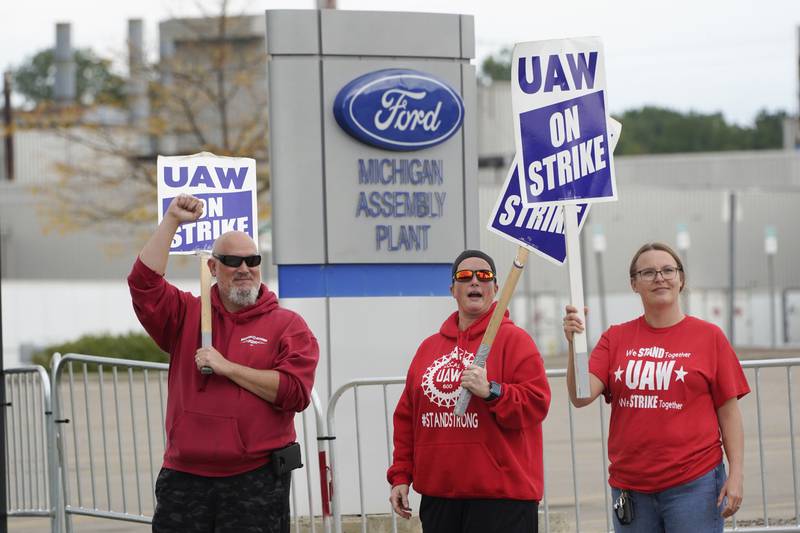 United Auto Workers members walk the picket line in September 2023 at the Ford Michigan Assembly Plant in Wayne, Michigan.