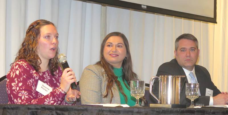 Deanne Phelps (from left), Liz Strom and Jason Lestina serve as panelists during a question-and-answer session at the Illinois Society of Professional Farm Managers and Rural Appraisers’ Land Values Conference.