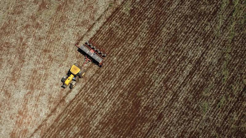 An agricultural machine plants soybeans on a farm in a rural area of Sidrolandia, Mato Grosso do Sul state, Brazil.