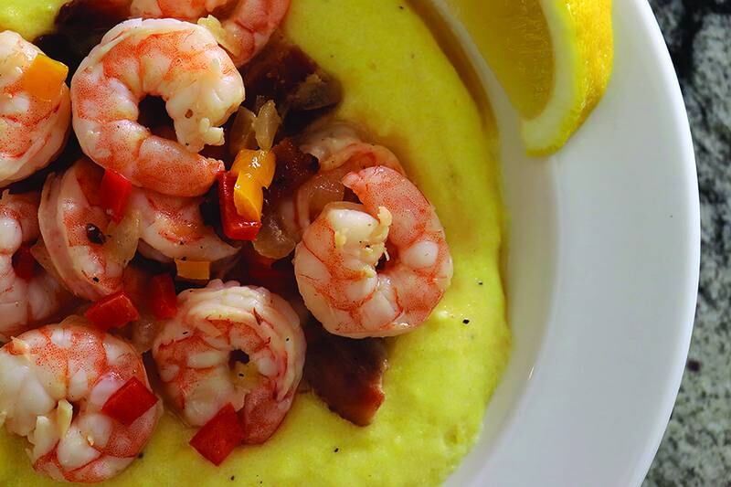 Perfect for a special brunch or dinner, creamy grits topped with shrimp in a velvety sauce is a southern brunch delicacy that warms the soul.
