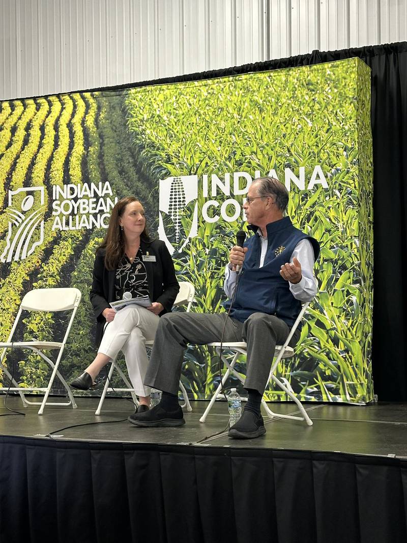 Gov. Mike Braun participates in a "fireside chat" with Courtney Kingery, CEO of the Indiana Soybean Alliance, the Indiana Corn Growers Association and the Indiana Corn Marketing Council, during the Indiana Ag Policy Summit at the Boone County Fairgrounds.