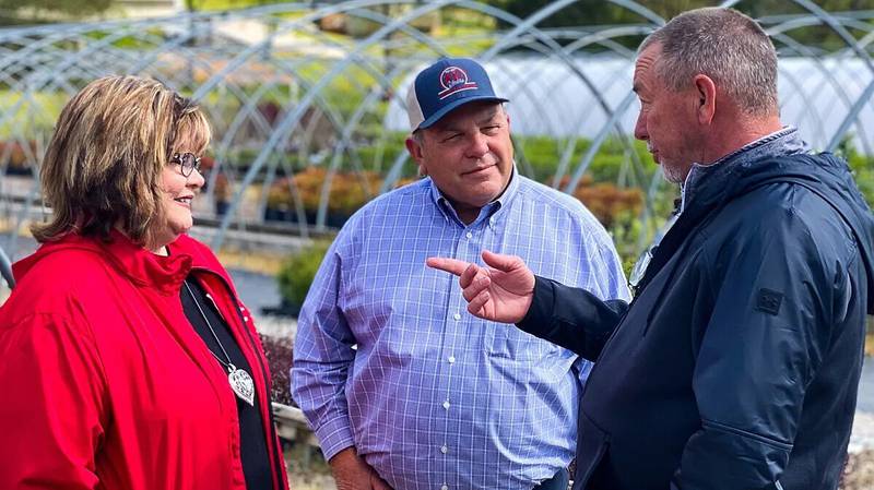 American Farm Bureau Federation President Zippy Duvall (center) visits with members at Holden Nursery Garden Center in Mascot, Tennessee.