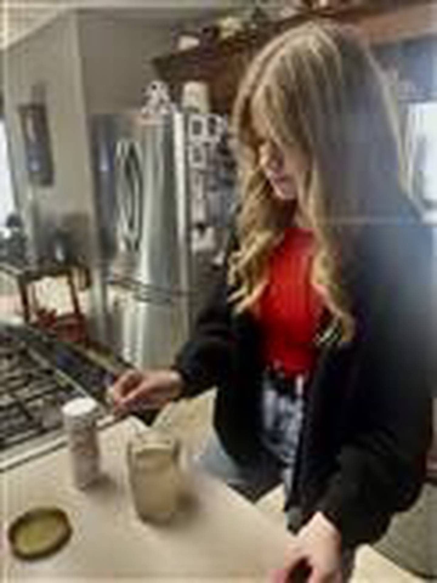 Lainie Clark conducts an experiment for her agriscience project that resulted in her becoming the District 5 Star finalist.