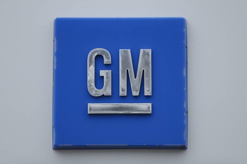A GM logo is shown at the General Motors Detroit-Hamtramck Assembly plant in Hamtramck, Mich.