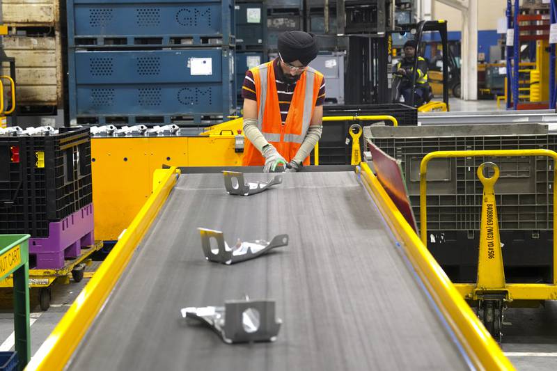 An employee works on the production line at the Martinrea auto parts manufacturing plant that supplies auto parts to Canada and U.S. plants, in Woodbridge, Ontario.