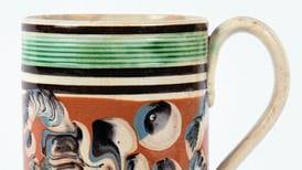 Antiques & Collecting: Colorful decorations on mocha mugs