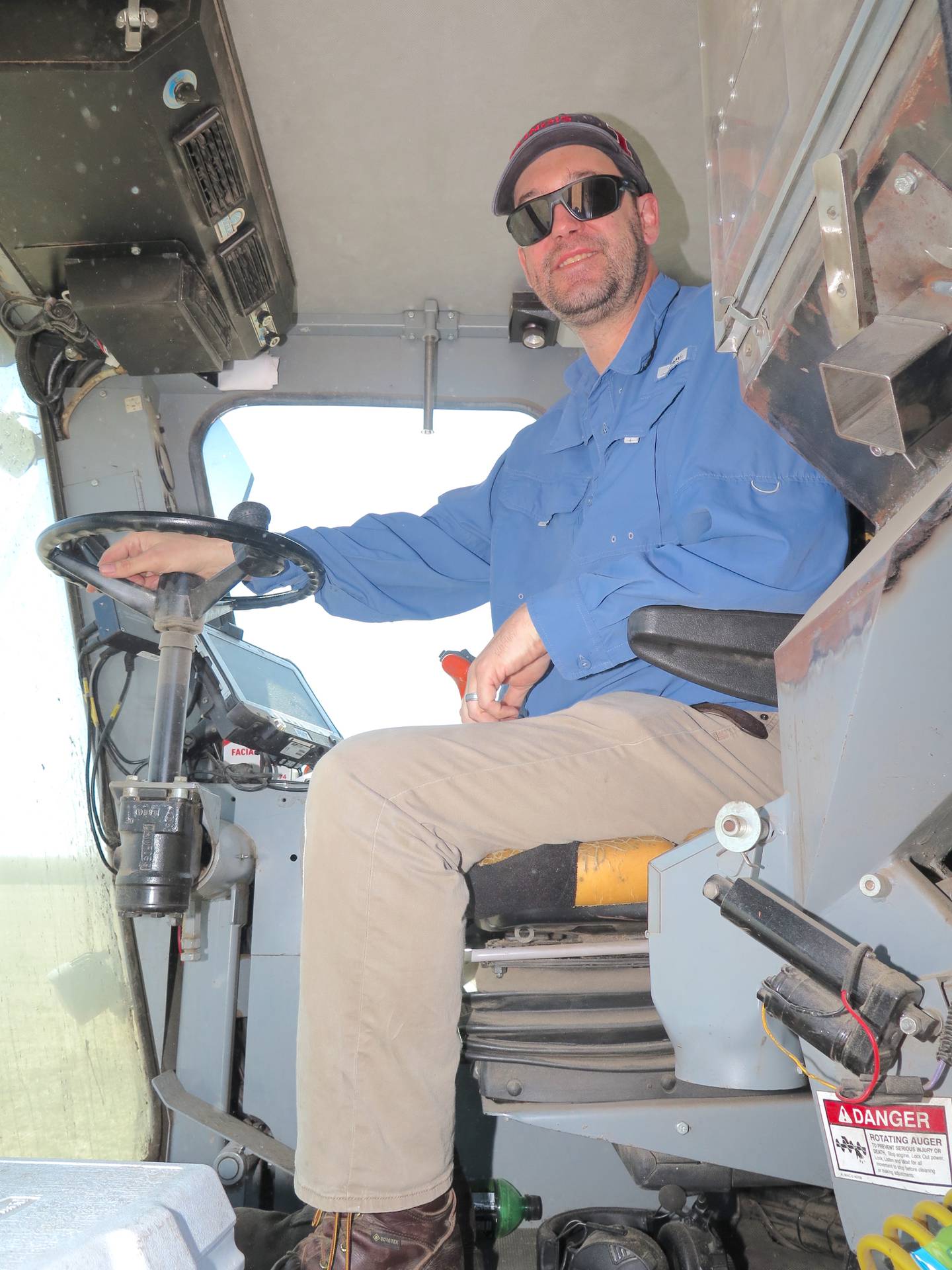 Clay Harper, University of Illinois senior research specialist, harvests soybeans in a field near Goodfield for the U of I Variety Testing program. The later maturity soybeans at the location averaged 82.7 per acre across all plots.