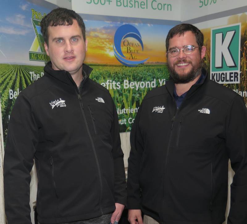 Trent Nicholson (left), Yield/Profit Challenge owner and a Pro-Soil Ag Solutions dealer, and Dan Esker, southern Illinois sales manager, detailed the 2024 on-farm field trial results during the recent Midwest Ag Expo.