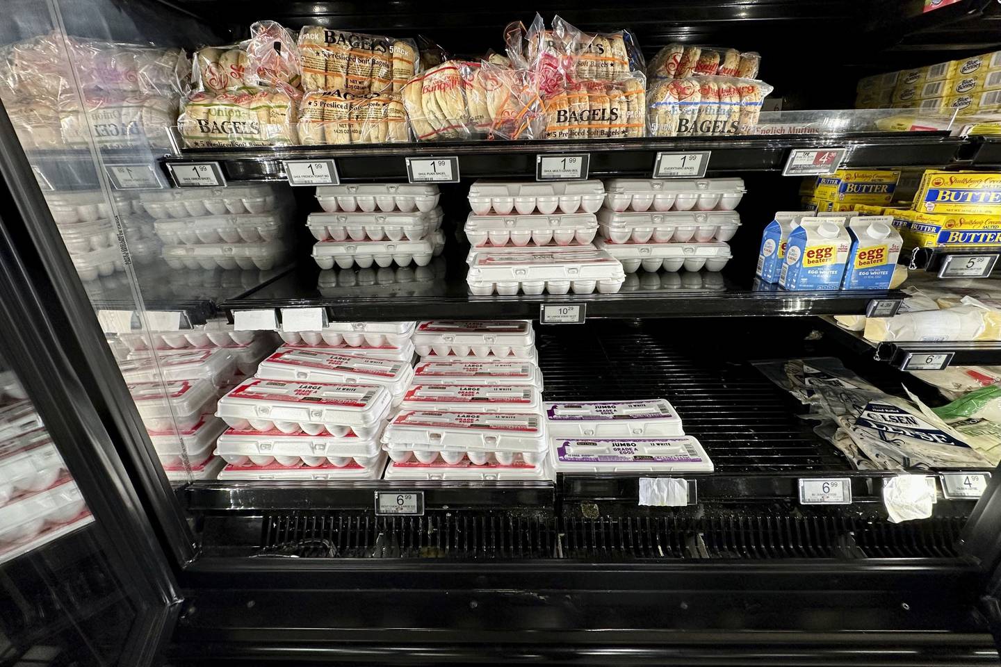 Eggs sit on a shelf at Sentyrz Liquor & Supermarket, where staff say they’ve been receiving only 10% of their weekly orders, in Minneapolis.