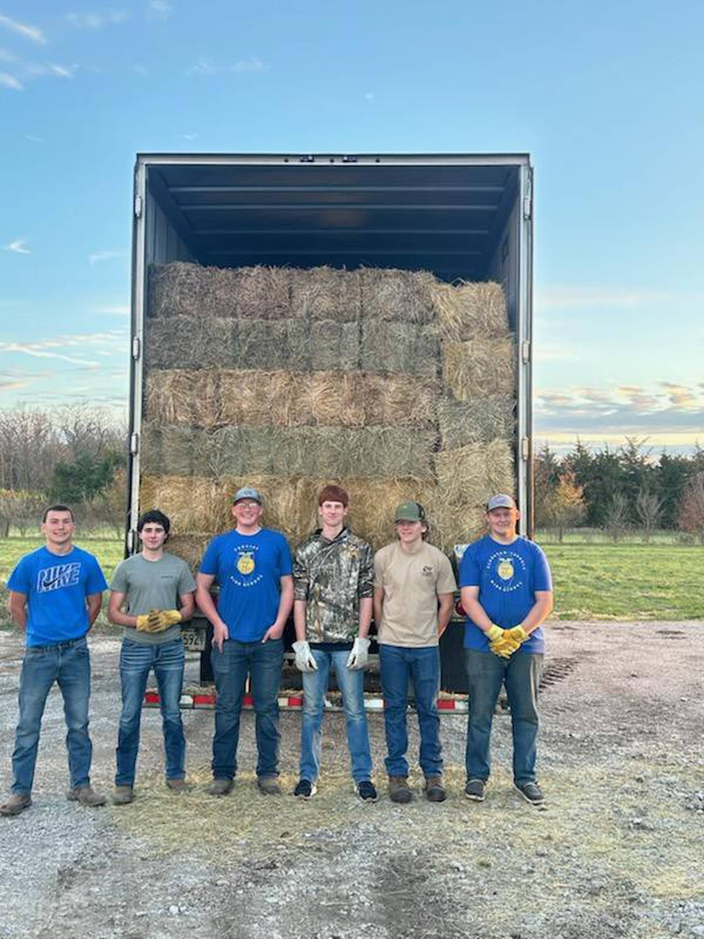 Members of Pontiac High School FFA and Normal Community High School FFA worked on a hay donation project organized by their advisers.
