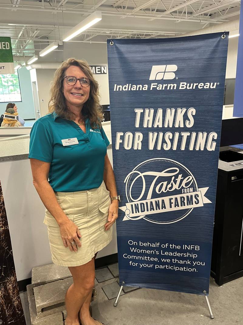 Mindy Orschell volunteers at Taste From Indiana Farms at the Indiana State Fair.