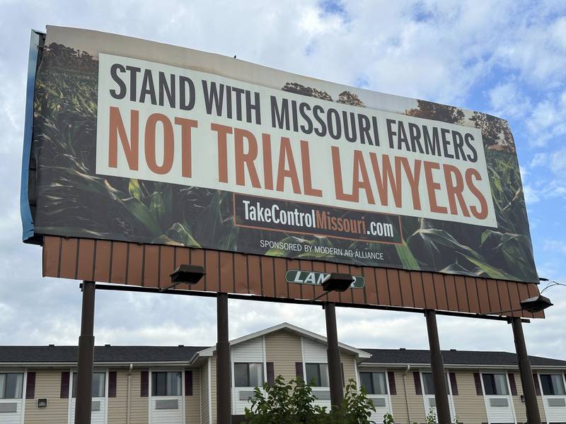 A billboard supporting legislation that would provide legal protection to manufacturers of pesticides such as Bayer’s popular weedkiller Roundup is shown in Jefferson City, Missouri.