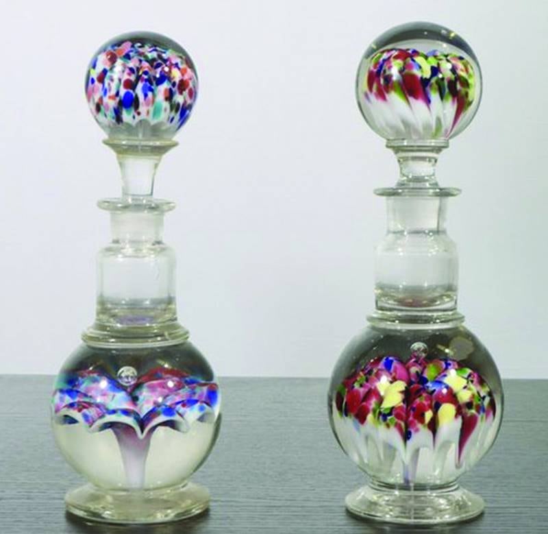 These paperweight inkwells demonstrate the unique glassmaking styles of Millville, New Jersey, and showcase the skill and creativity of their glassworkers.
