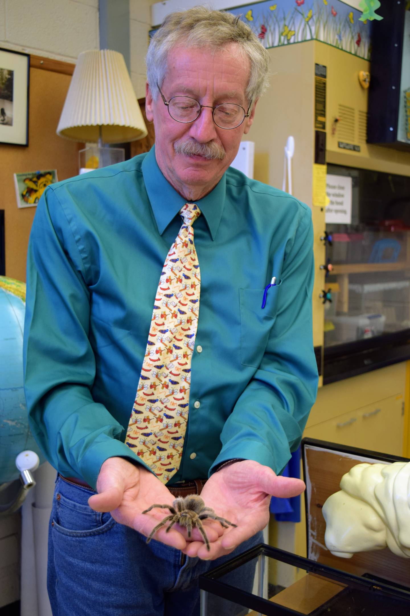 Tom Turpin, now a retired entomology professor, holds a tarantula at Purdue University. Entomologists study and research insects and their behavior. This is especially important in the agriculture industry, where beneficial insects, pollinators and pests affect yields every year.