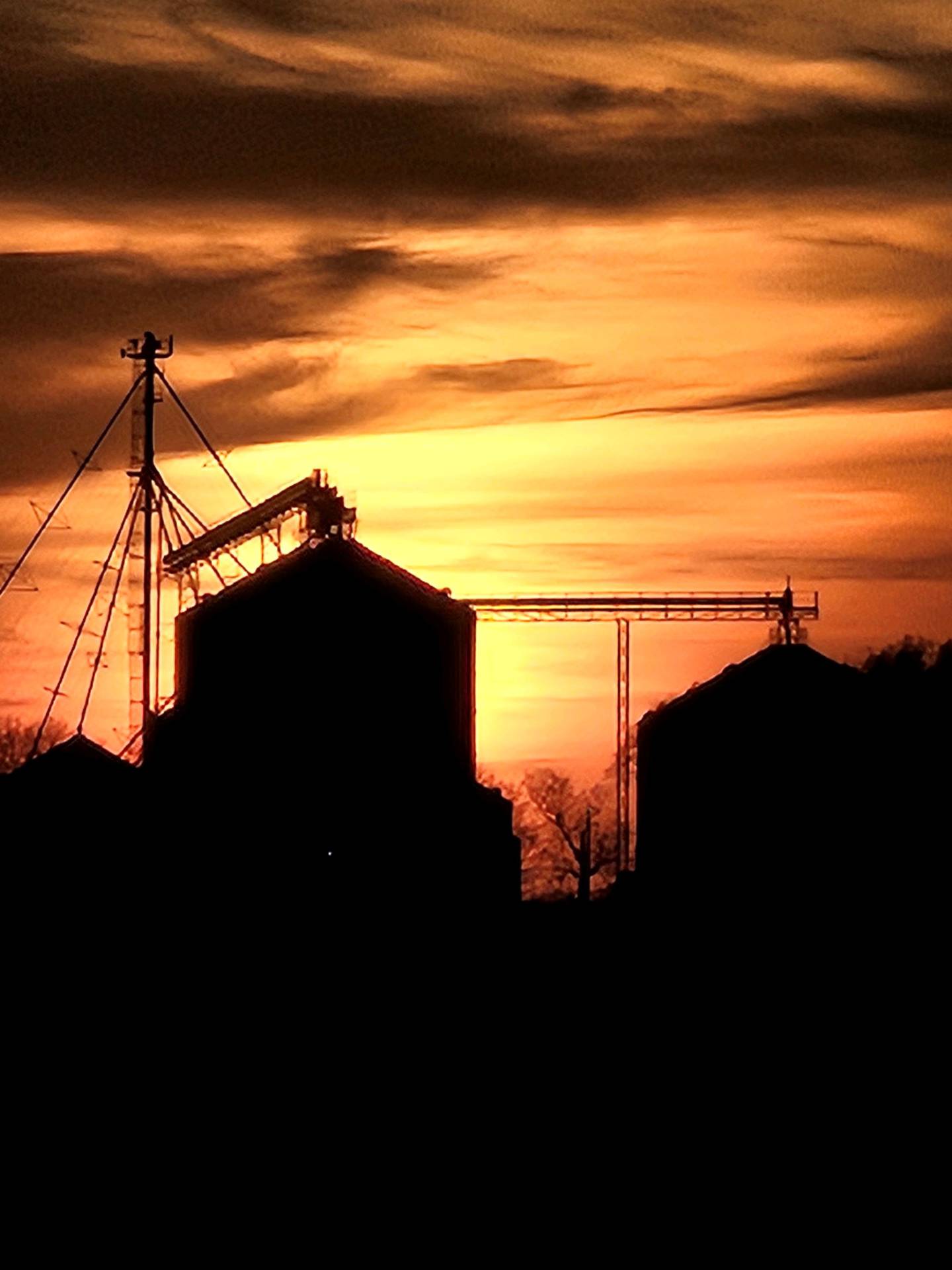 “At the End of the Day” — Bonnie Postma: “Caught this picture at the end of the day. It was a good day, crops were good and God sent that beautiful sunset.”