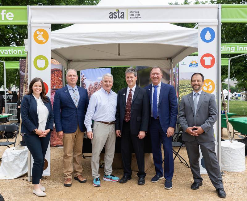 Beck’s employees gather for a photo with American Seed Trade Association leadership.