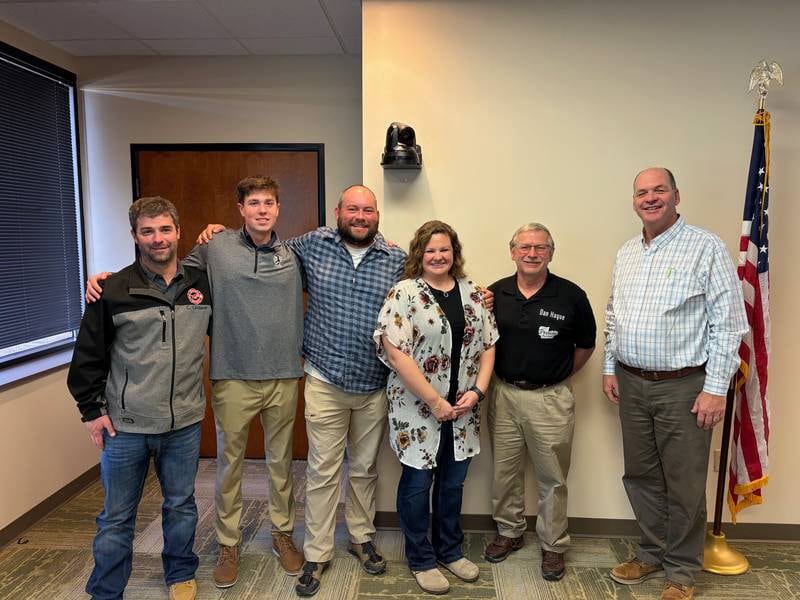 Craig Lindauer (from left), father of scholarship winner Madison Lindauer; Joseph Renners; Alex and Abby Lueken; Daniel Hague; and Steve Obert are celebrated as the 2026 Indiana Dairy Producers award winners.
