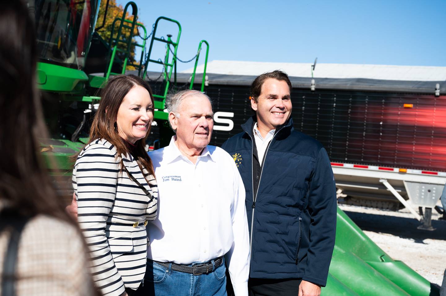 Secretary of Agriculture Brooke Rollins poses for a photo with Congressman Jim Baird and his son, state Rep. Beau Baird.