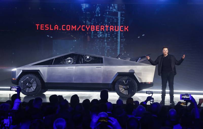 Tesla CEO Elon Musk introduces the Cybertruck at Tesla’s design studio in 2019 in Hawthorne, California. The windows were broken during a demonstration intended to show the strength of the glass.