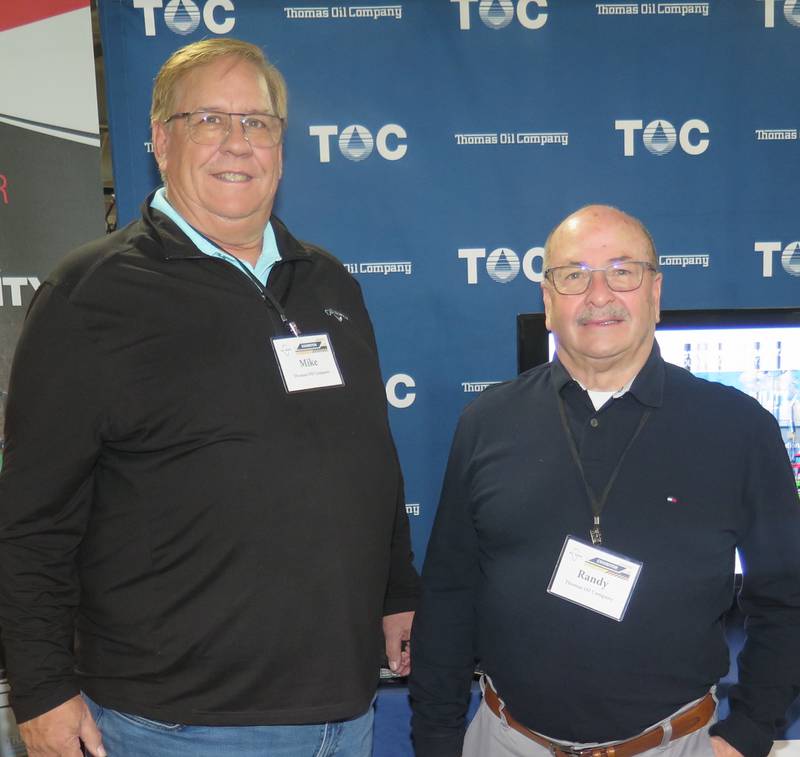 Mike McCafferty (left), Illinois sales manager, and Randy Brown, sales director, were at the Thomas Oil Company booth during the Midwest Ag Expo to promote the company’s products and services.