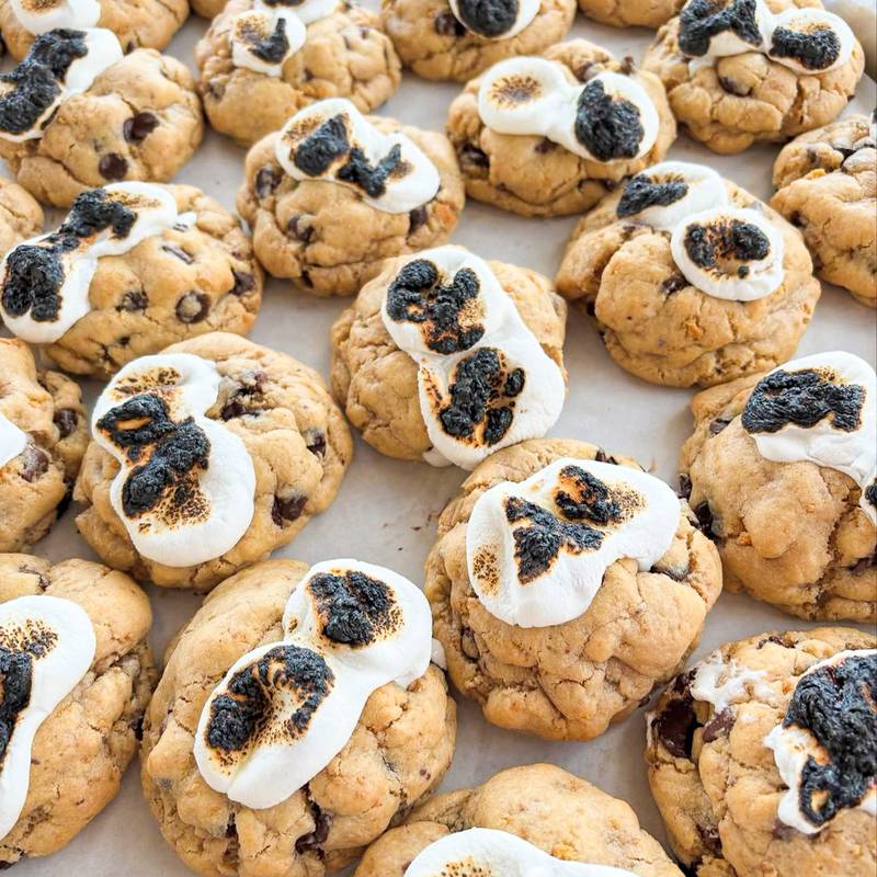 S’mores Cookie by The Cavity Factory. This cookie is a graham cracker base with milk chocolate and dark chocolate. Topped with a marshmallow that can be torched.