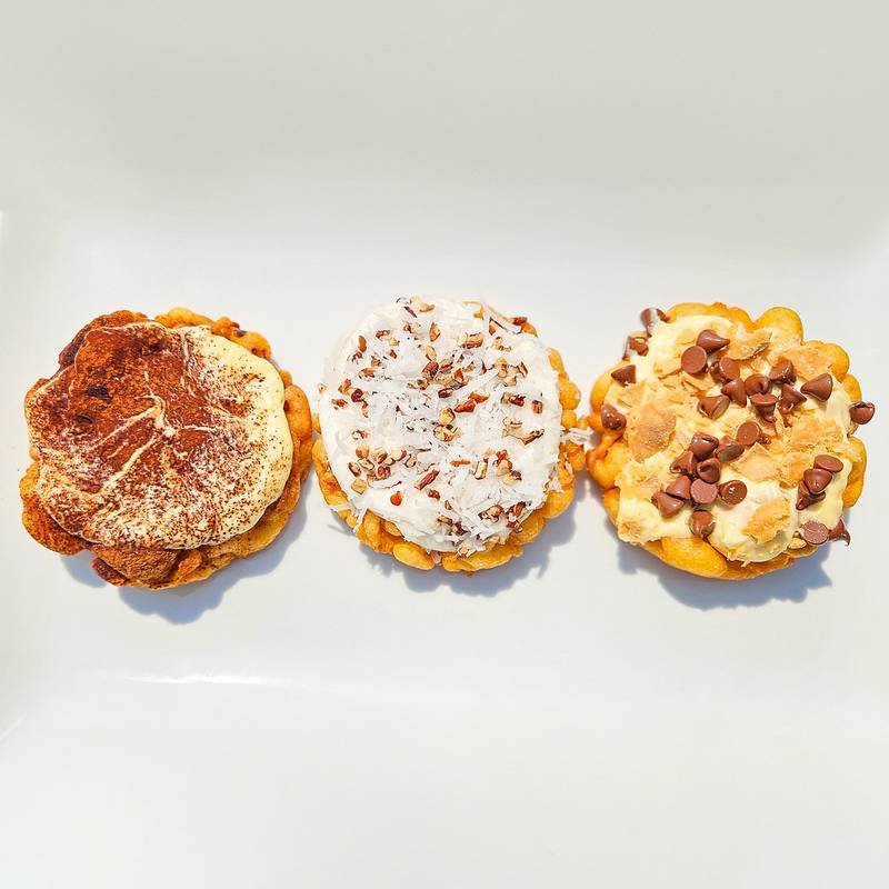 Trio of Italy by Freund Family Foods. A flight of three mini-Italian inspired funnel cakes: tiramisu, Italian wedding cake and cannoli.
