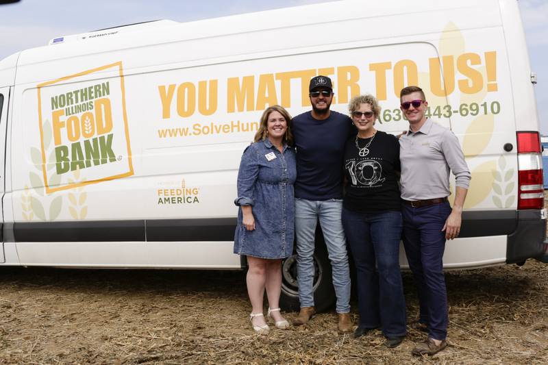Northern Illinois Food Bank, Bayer and Luke Bryan have partnered for 10 years to support rural communities and hunger. Pictured are Colleen Ahearn (from left), chief philanthropy officer, NIFB; Luke Bryan; Beth Roden, senior vice president communications, Bayer North America; and Charles Blazevich, senior manager of corporate partnerships, Feeding America.