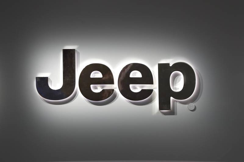 A Jeep logo is displayed at the North American International Auto Show in Detroit in 2019.