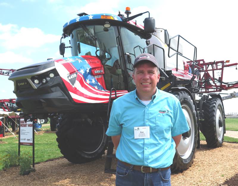 AgriNews photo/Tom C. Doran
Dan Koepke, Jenner Ag account manager, details the features of the new Case IH Patriot 50 Series applicators. The Patriot 4450 was displayed at the Midwest Ag Industries Exposition with its 1,600-gallon capacity tank, 390 horsepower engine, and new cab comfort features.