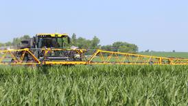 Spraying protects corn, soybeans from pests, diseases